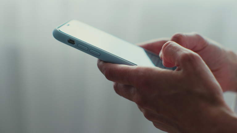 Someone holding a phone
